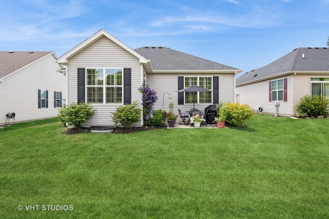 321 Mahogany Dr, Algonquin, IL 60102 - back of house with a yard and a shingled roof