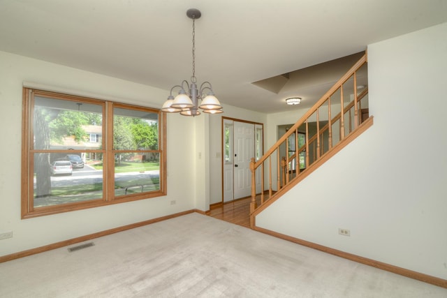 1268 Country Glen Ln, Carol Stream, IL 60188 - foyer entrance featuring stairway, carpet flooring, and a chandelier
