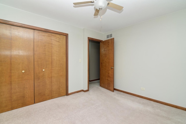 1268 Country Glen Ln, Carol Stream, IL 60188 - unfurnished bedroom featuring light carpet, a closet, and ceiling fan