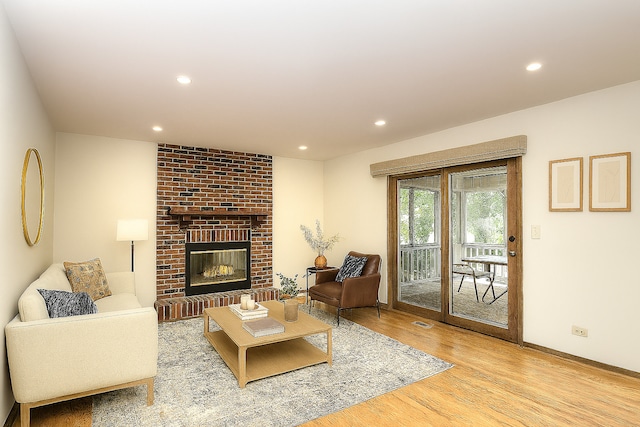 1268 Country Glen Ln, Carol Stream, IL 60188 - living room featuring wood finished floors, recessed lighting, and a brick fireplace