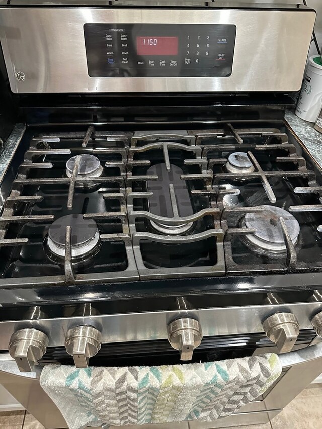 443 Commanche Trl, Wheeling, IL 60090 - kitchen view of stainless steel range with gas stovetop