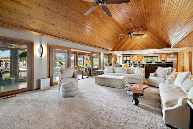 998 N Westshore Blvd, Manteno, IL 60950 - living room featuring wood ceiling, a ceiling fan, healthy amount of natural light, light carpet, and high vaulted ceiling