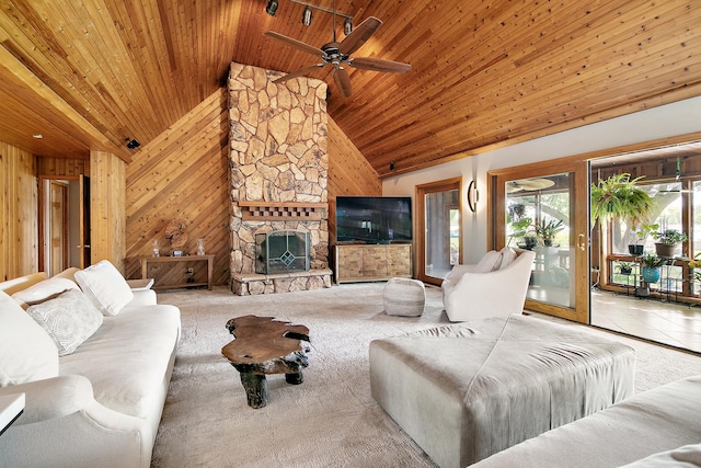 998 N Westshore Blvd, Manteno, IL 60950 - living room with wooden ceiling, wood walls, a ceiling fan, a fireplace, and carpet flooring