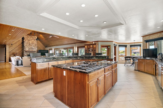 998 N Westshore Blvd, Manteno, IL 60950 - kitchen with plenty of natural light, stainless steel gas cooktop, recessed lighting, brown cabinetry, and a large island