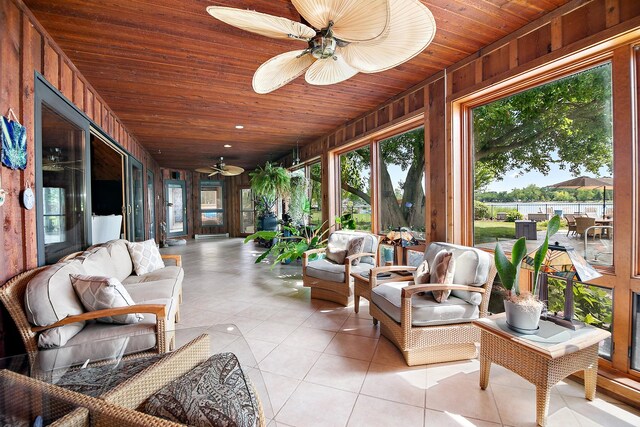998 N Westshore Blvd, Manteno, IL 60950 - sunroom with wooden ceiling, tile patterned floors, plenty of natural light, and wood walls
