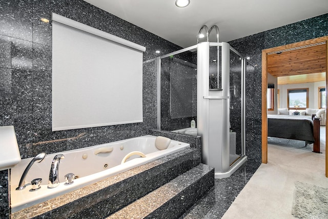 998 N Westshore Blvd, Manteno, IL 60950 - full bathroom with a shower stall, a tub with jets, connected bathroom, and tile walls