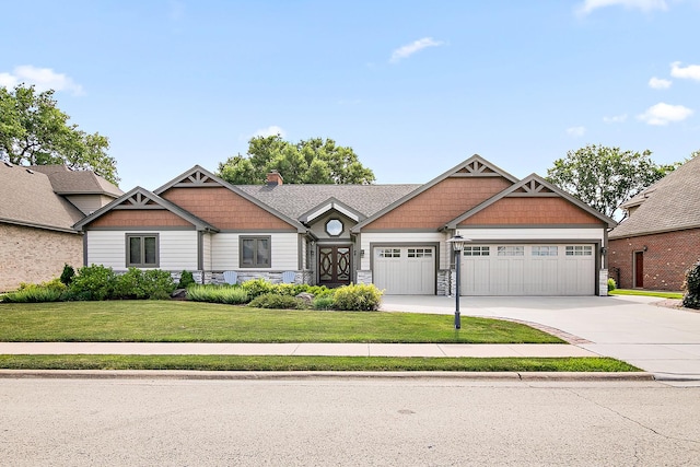 998 N Westshore Blvd, Manteno, IL 60950 - craftsman inspired home with a front yard, stone siding, an attached garage, and concrete driveway