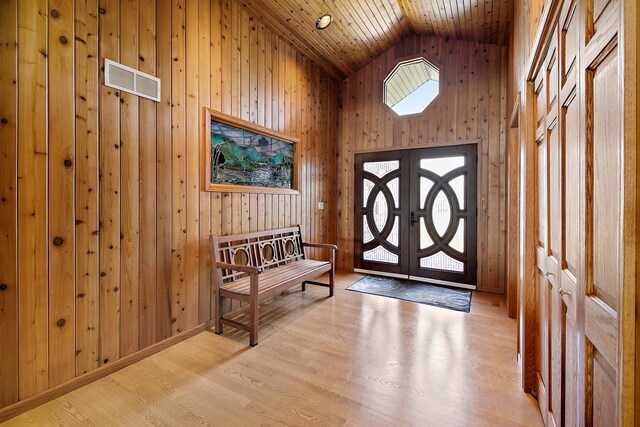 998 N Westshore Blvd, Manteno, IL 60950 - foyer entrance featuring wood walls, high vaulted ceiling, wood ceiling, wood finished floors, and french doors