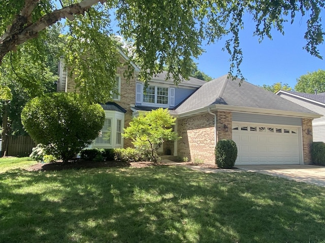 348 Bloomfield Cir, Bloomingdale, IL 60108 - view of front of property with brick siding, an attached garage, driveway, and a shingled roof