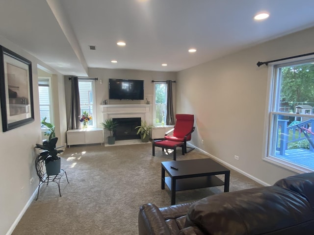 348 Bloomfield Cir, Bloomingdale, IL 60108 - living room featuring carpet flooring, recessed lighting, and a fireplace with flush hearth