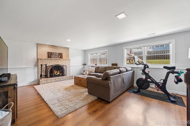 933 Saginaw Ct, Carol Stream, IL 60188 - living area with wood finished floors and a brick fireplace
