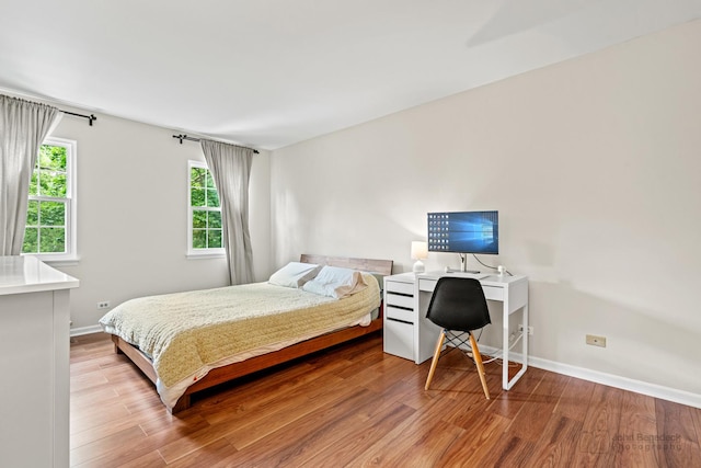 223 New Bridge Ct, Palatine, IL 60067 - bedroom featuring wood finished floors and a desk