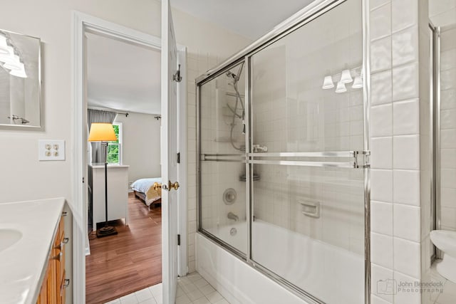 223 New Bridge Ct, Palatine, IL 60067 - full bath with enclosed tub / shower combo, vanity, ensuite bath, and tile patterned floors