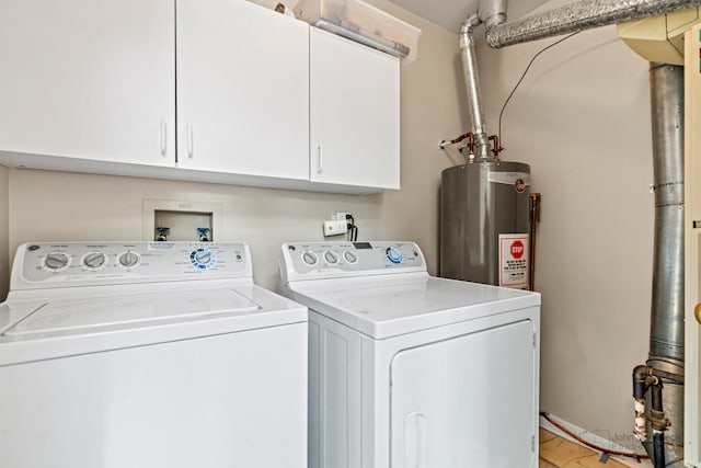 223 New Bridge Ct, Palatine, IL 60067 - laundry area with washer and clothes dryer, water heater, and cabinet space