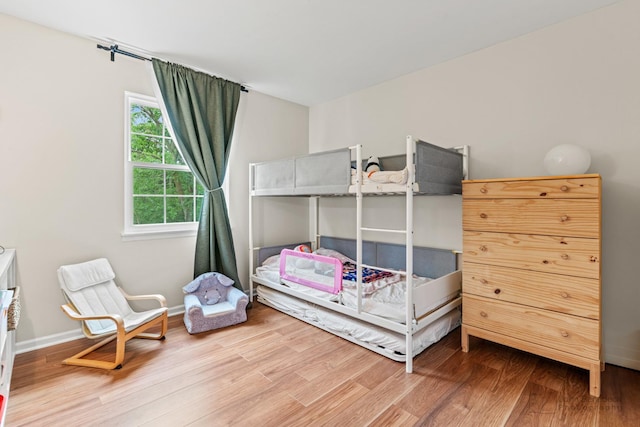 223 New Bridge Ct, Palatine, IL 60067 - bedroom with wood finished floors and baseboards