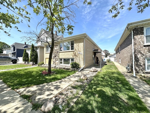1216 N 20th Ave, Melrose Park, IL 60160 - view of property exterior featuring a yard and brick siding