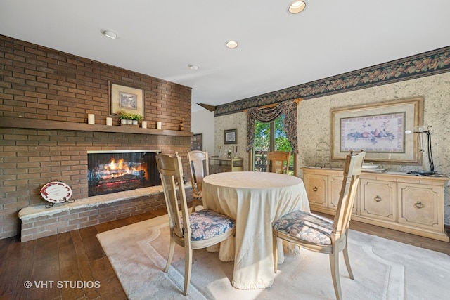 104 Lois Ln, Deer Park, IL 60010 - dining room with wallpapered walls, hardwood / wood-style flooring, and a fireplace