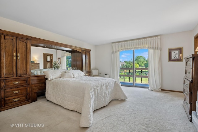 104 Lois Ln, Deer Park, IL 60010 - bedroom featuring access to exterior and light colored carpet