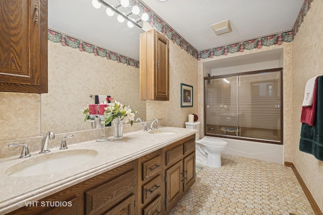 104 Lois Ln, Deer Park, IL 60010 - bathroom featuring double vanity, shower / bath combination with glass door, and wallpapered walls