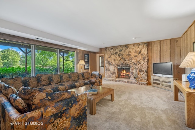 104 Lois Ln, Deer Park, IL 60010 - carpeted living room with wooden walls and a fireplace