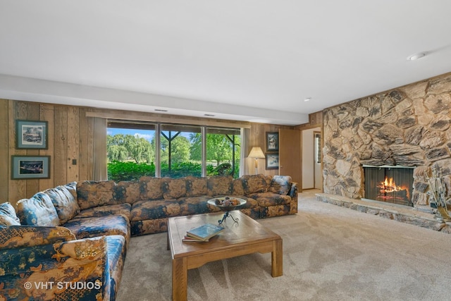 104 Lois Ln, Deer Park, IL 60010 - carpeted living area featuring wood walls and a stone fireplace