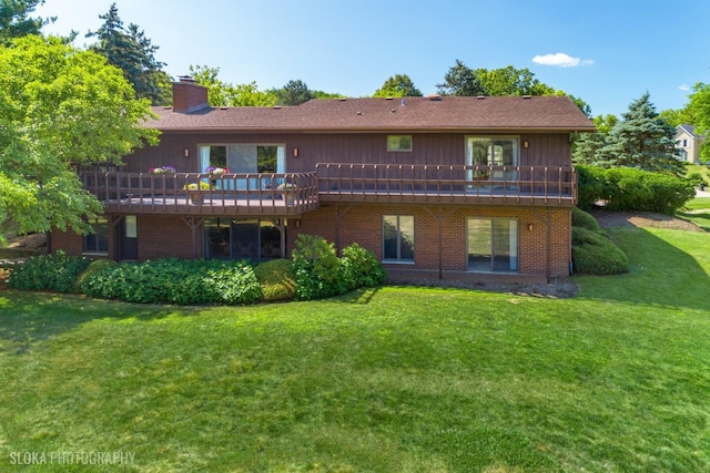 104 Lois Ln, Deer Park, IL 60010 - back of house featuring a chimney, a lawn, a deck, and brick siding