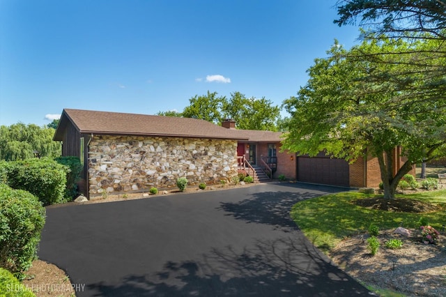104 Lois Ln, Deer Park, IL 60010 - ranch-style house featuring a chimney, driveway, brick siding, and stone siding