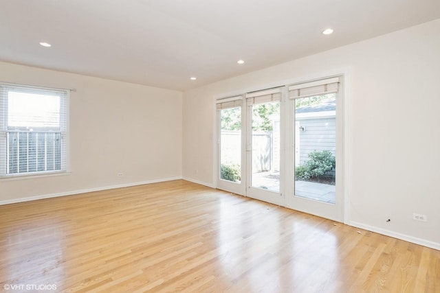 3231 Central St, Evanston, IL 60201 - unfurnished room featuring light wood finished floors and recessed lighting