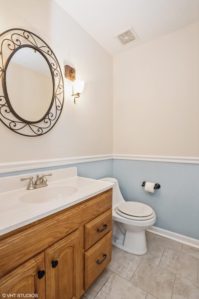 3231 Central St, Evanston, IL 60201 - half bath featuring vanity and toilet