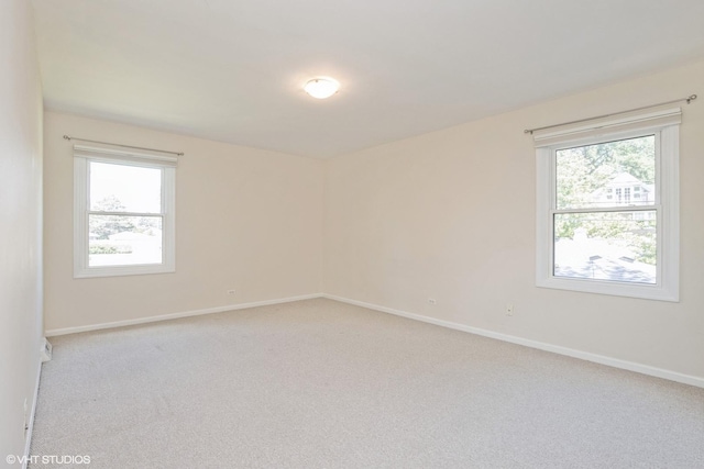 3231 Central St, Evanston, IL 60201 - empty room featuring plenty of natural light and carpet
