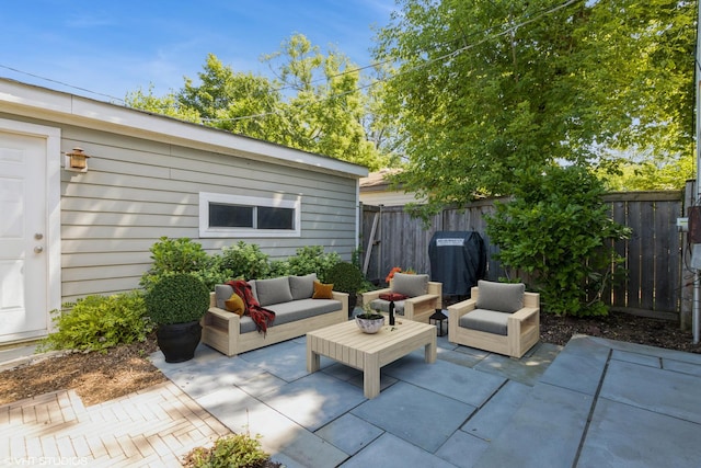 3231 Central St, Evanston, IL 60201 - fenced backyard with an outdoor living space, a patio area, and area for grilling