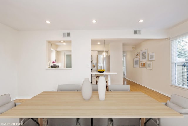 3231 Central St, Evanston, IL 60201 - dining room featuring recessed lighting and light wood-style floors