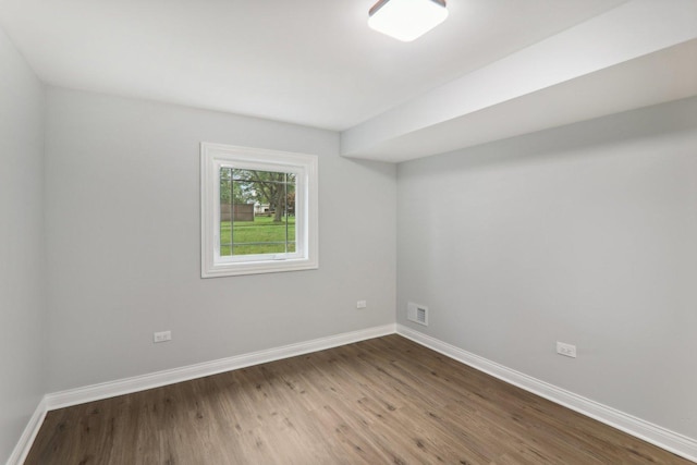 7701 Sawyer Rd, Darien, IL 60561 - unfurnished room featuring wood finished floors and baseboards