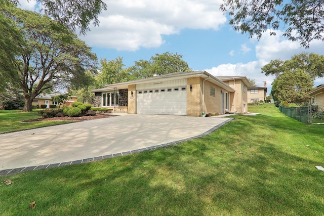 7701 Sawyer Rd, Darien, IL 60561 - ranch-style home with brick siding, a garage, and concrete driveway