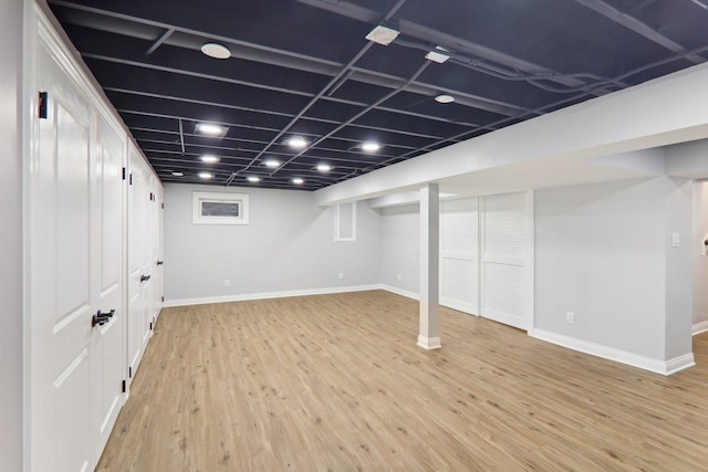 7701 Sawyer Rd, Darien, IL 60561 - finished basement featuring baseboards and light wood-style flooring
