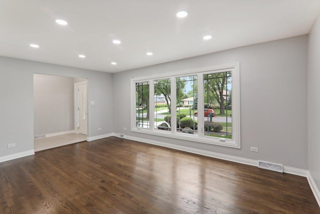 7701 Sawyer Rd, Darien, IL 60561 - spare room featuring healthy amount of natural light, recessed lighting, and dark wood-style floors