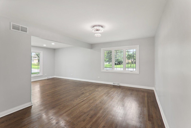 7701 Sawyer Rd, Darien, IL 60561 - spare room with dark wood-style floors