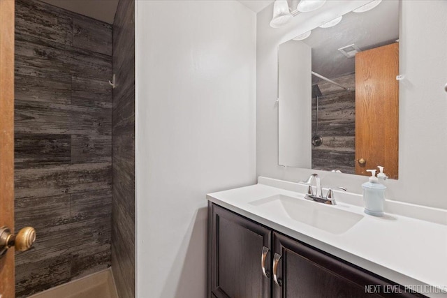 27W414 Melrose Ln, Winfield, IL 60190 - bathroom featuring a tile shower and vanity