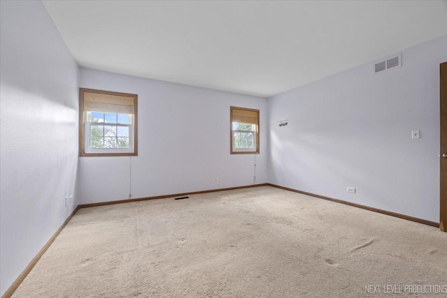 27W414 Melrose Ln, Winfield, IL 60190 - empty room with plenty of natural light and carpet flooring