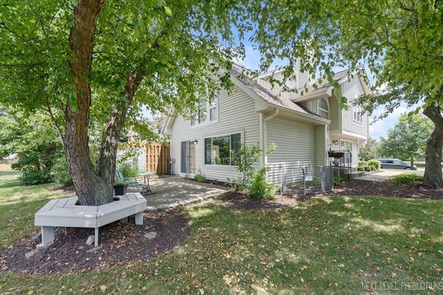 27W414 Melrose Ln, Winfield, IL 60190 - view of side of property featuring a chimney and a patio