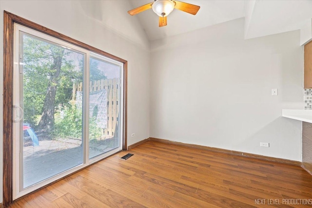 27W414 Melrose Ln, Winfield, IL 60190 - spare room with light wood finished floors, vaulted ceiling, and a ceiling fan