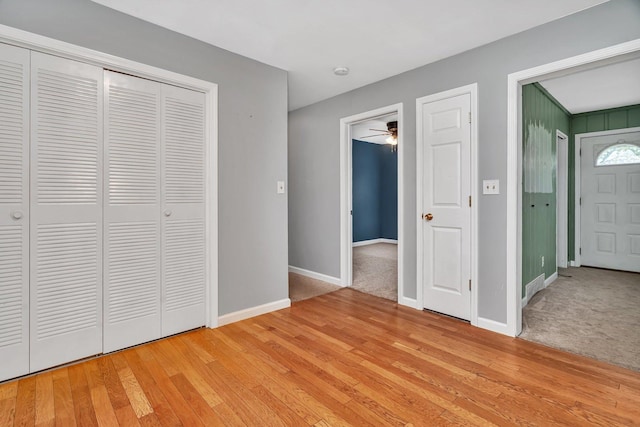 25034 S Center St, Channahon, IL 60410 - unfurnished bedroom with light wood-type flooring and a closet