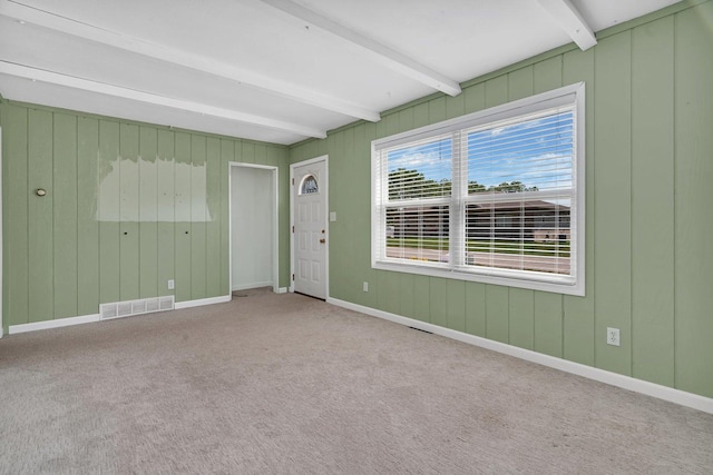 25034 S Center St, Channahon, IL 60410 - empty room with beam ceiling and carpet flooring