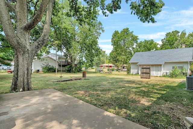 25034 S Center St, Channahon, IL 60410 - view of grassy yard with a patio