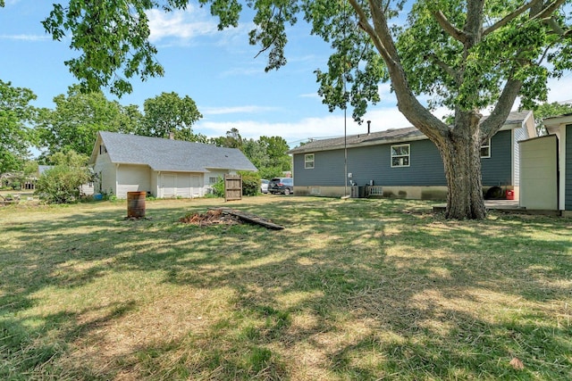 25034 S Center St, Channahon, IL 60410 - view of grassy yard with a detached garage