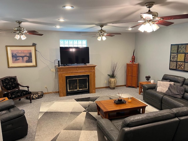1006 Maple Hill Rd, Bloomington, IL 61705 - living room featuring carpet floors, a ceiling fan, recessed lighting, and a glass covered fireplace