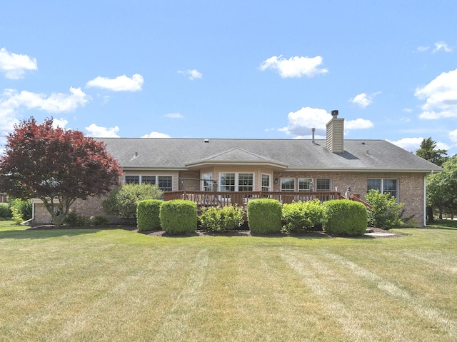3710 W Nettle Creek Dr, Morris, IL 60450 - back of house featuring brick siding, a yard, a chimney, and a deck