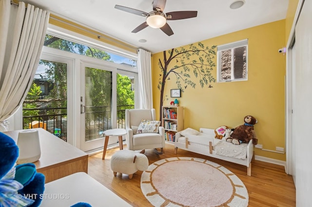 2145 W Crystal St Unit 2, Chicago, IL 60622 - sitting room featuring light wood-type flooring and a ceiling fan