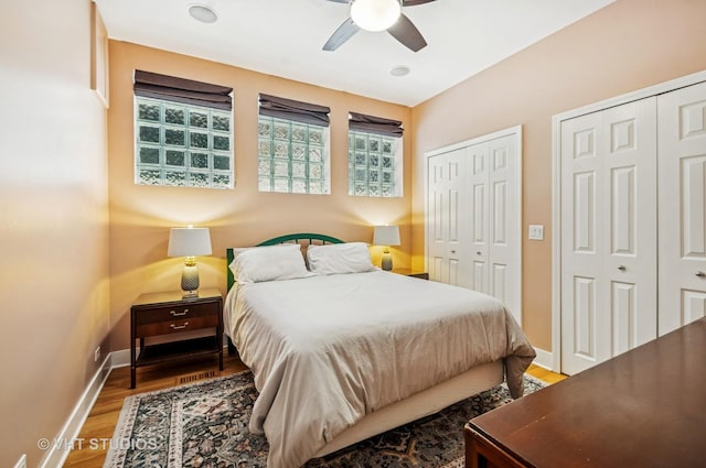 2145 W Crystal St Unit 2, Chicago, IL 60622 - bedroom featuring multiple closets, wood finished floors, and ceiling fan
