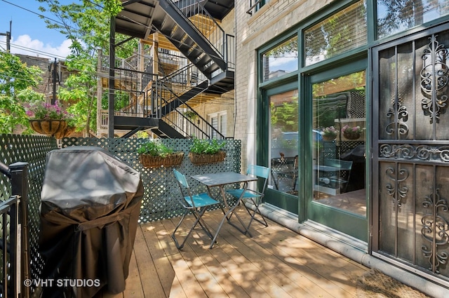 2145 W Crystal St Unit 2, Chicago, IL 60622 - wooden deck featuring stairs and area for grilling